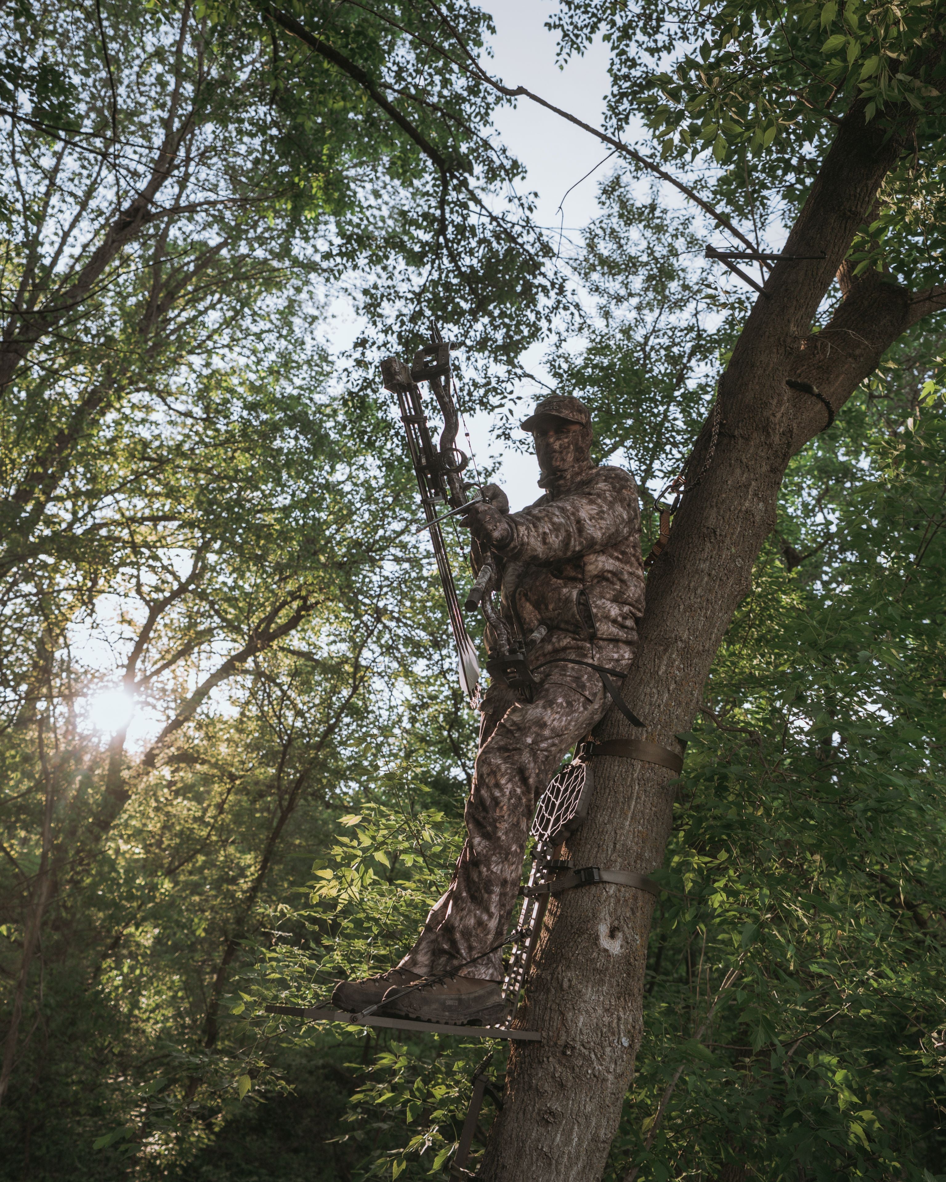 hunter wearing asio gear rapx camo during an afternoon early season bowhunt