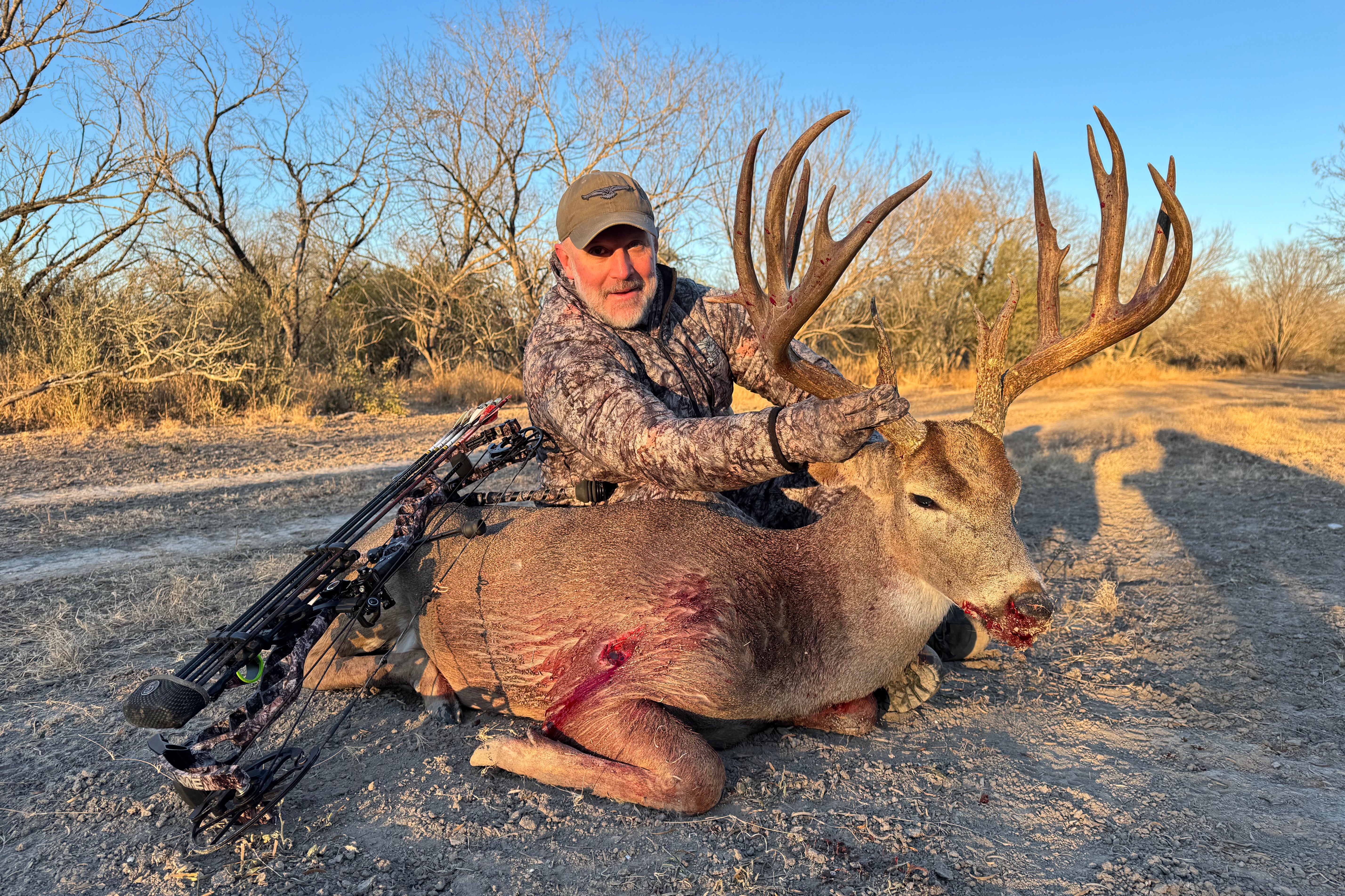 Joe Miles of ASIO Gear with a giant Texas whitetail