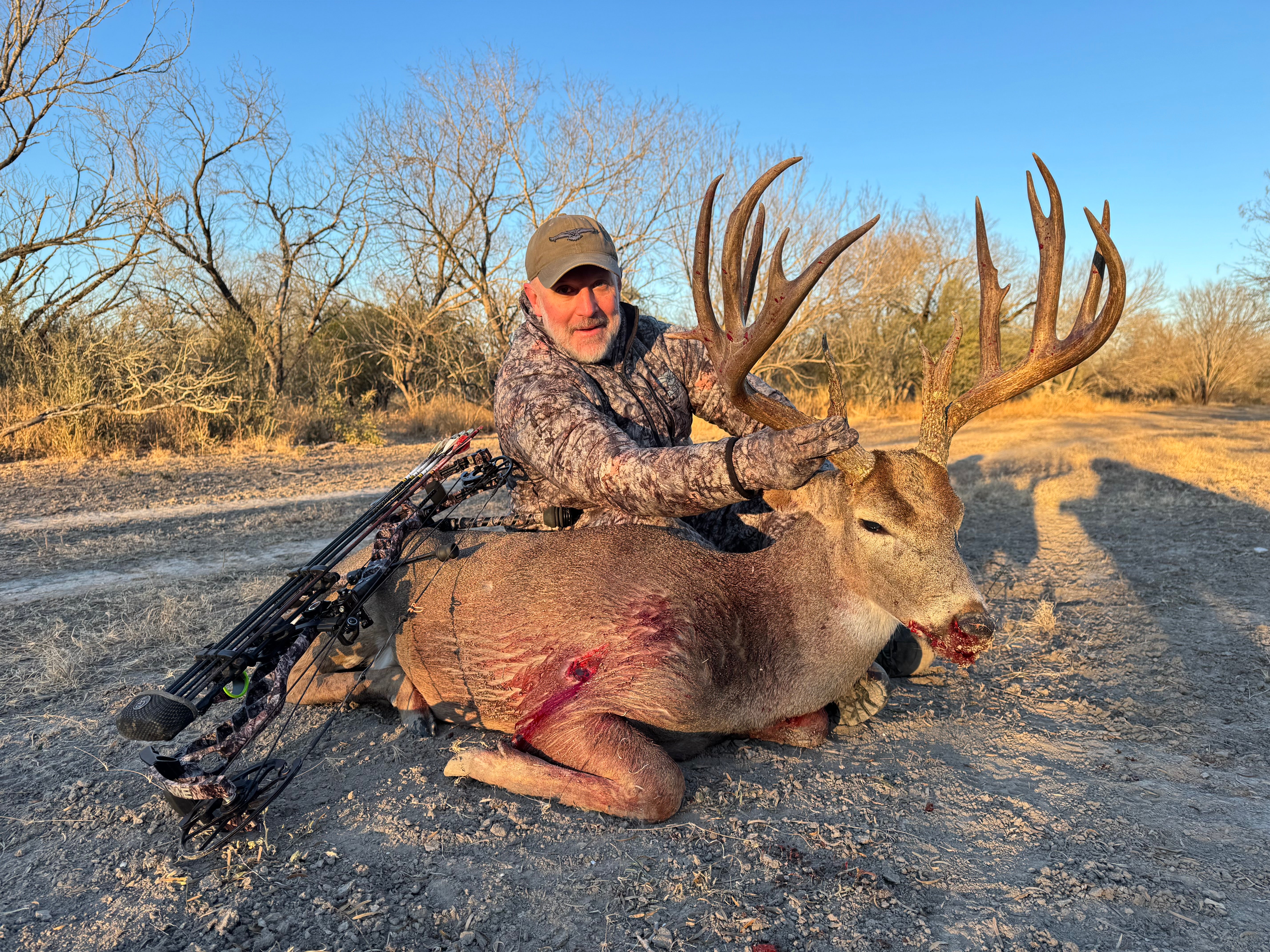 Joe Miles of ASIO Gear with a giant Texas whitetail 