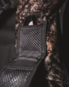 ASIO Gear RAPTOR camo turkey vest magnetic diaphragm call pocket for quick-access mouth call storage