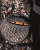 ASIO Gear RAPTOR camo turkey vest mesh pot call holder designed for secure and quiet access in the field