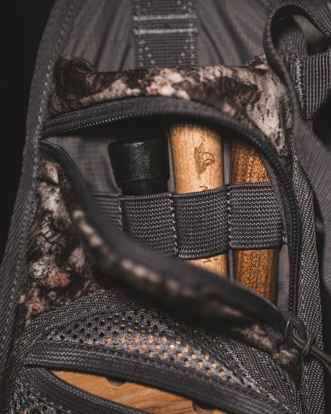 ASIO Gear RAPTOR camo turkey vest striker pocket designed for secure and quiet call striker storage