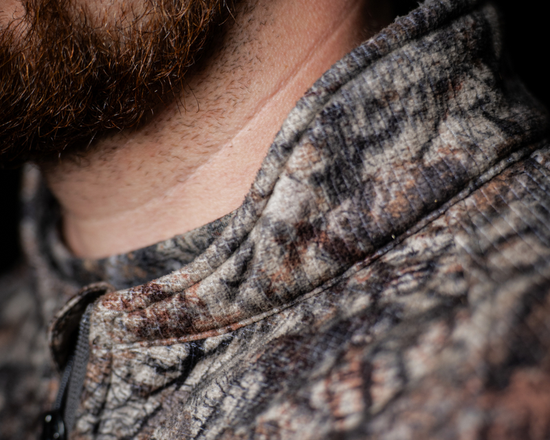 ASIO Gear patented bowhunting collar to help prevent string interference at full draw for whitetail bowhunters
